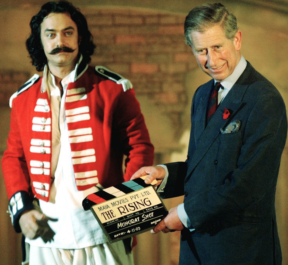 BRITAIN'S PRINCE CHARLES SNAPS THE CLAPPERBOARD AT THE LAUNCH OF
BOLLYWOOD FILM BRITAIN'S PRINCE CHARLES SNAPS THE CLAPPERBOARD AT THE LAUNCH OF BOLLYWOOD FILM