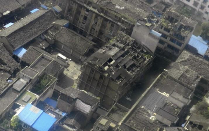 An aerial view shows houses damaged after a strong earthquake in Lushan county, Ya'an, Sichuan province, April 20, 2013(Reuters) An aerial view shows houses damaged after a strong earthquake in Lushan county, Ya'an, Sichuan province, April 20, 2013(Reuters)