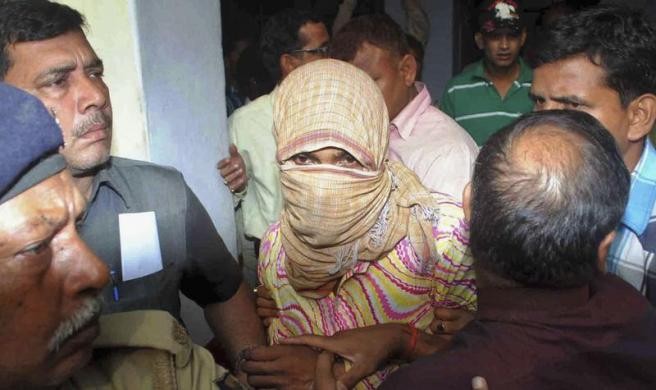 Police Officers Escort Manoj Kumar Accused of Raping and Torturing a Five-Year-Old Girl, at a Court in Muzaffarpur in Bihar