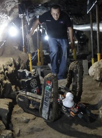A robot used to explore ruins is seen on the entrance of a tunnel in the archaeological area of the Quetzalcoatl Temple near the Pyramid of the Sun at the Teotihuacan archaeological site, about 60 km (37 miles) north of Mexico City. (Credit: Reuters) A robot used to explore ruins is seen on the entrance of a tunnel in the archaeological area of the Quetzalcoatl Temple near the Pyramid of the Sun