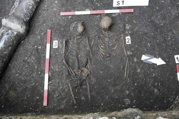 The skeletons of a man and woman buried holding hands are seen in a graveyard in Cluj-Napoca. (Reuters) The skeletons of a man and woman buried holding hands are seen in a graveyard in Cluj-Napoca. (Reuters)