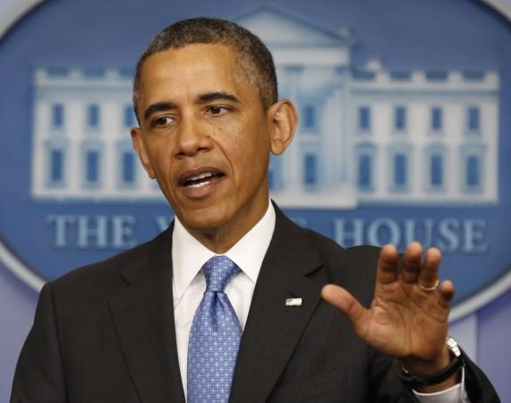 U.S. President Barack Obama gestures while talking