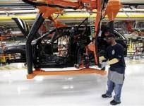 chrysler-auto-assembly-worker-michael-ricks-works-on-the-assembly-line-attaching-doors-to-the-all-new-2011-jeep-cherokee039s-at-the-jefferson-north-assembly-plant-in-detroit