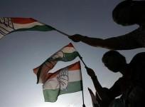 supporters-of-congress-party-wave-party-flags-at-an-election-rally-in-bangalore-representational-image