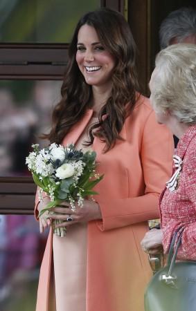Britain's Catherine, Duchess of Cambridge, smiles as she leaves after visiting the Naomi House children's hospice in Sutton Scotney, southern England Duchess of Cambridge
