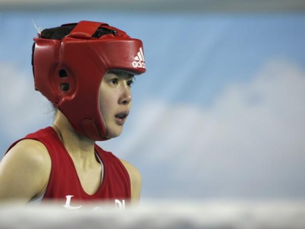 Lee Si-young prepares for her match in the 48 kg (106 lb) class at the South Korean national team tryouts in Chungju Lee Si-young