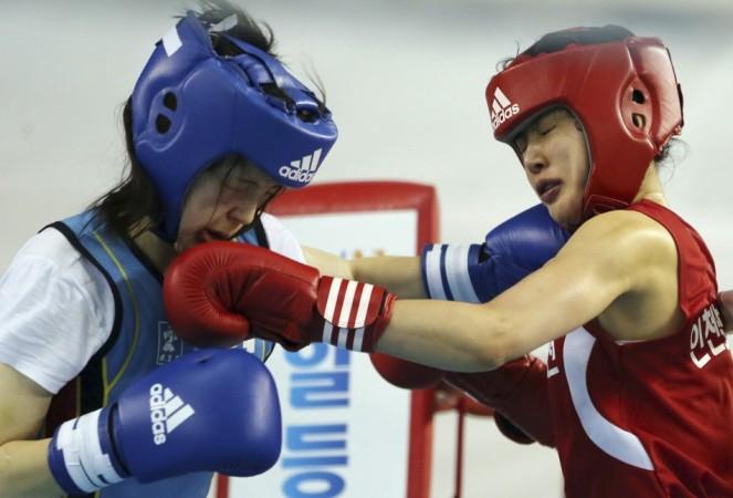 Lee Si-young prepares for her match in the 48 kg (106 lb) class at the South Korean national team tryouts in Chungju Lee Si-young