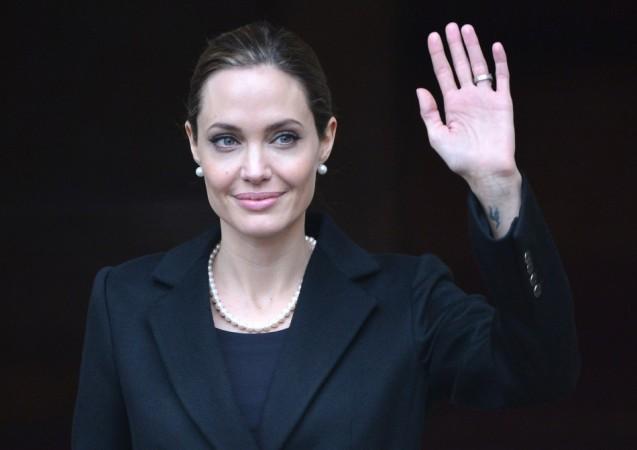 File photo of U.S. actress and humanitarian campaigner Angelina Jolie leaving a G8 Foreign Ministers Meeting in London Angelina Jolie