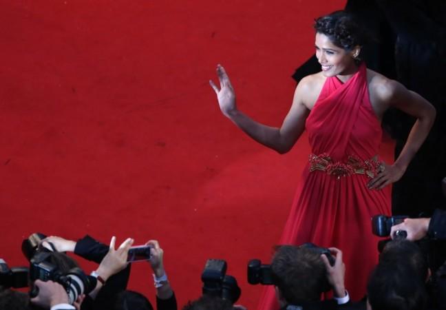 Actress Freida Pinto poses on the red carpet as she arrives for the screening of the film 'The Great Gatsby' Freida Pinto