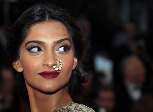 Bollywood actress Sonam Kapoor poses on the red carpet as she arrives for the screening of the film 'The Great Gatsby' Sonam Kapoor