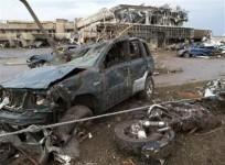 a-destroyed-motorcycle-lies-next-to-a-crushed-vehicle-after-a-huge-tornado-struck-moore-oklahoma-near-oklahoma-city-may-20-2013-reuters-richard-rowe