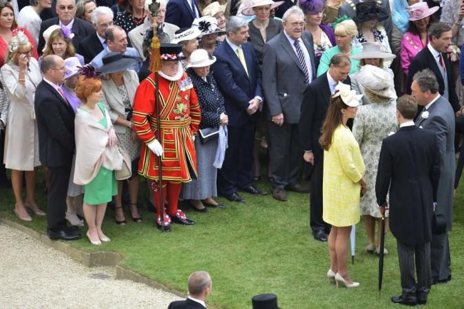 Britain's Catherine, Duchess of Cambridge attends a garden party with Camilla, Duchess of Cornwall at Buckingham Palace in London Duchess of Cambridge