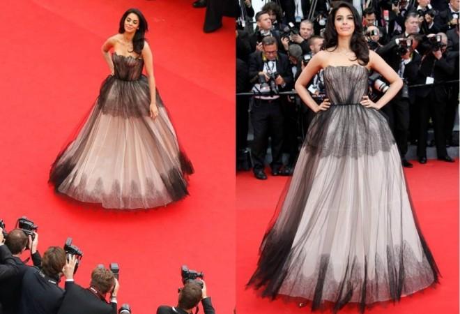 Mallika Sherawat poses on the red carpet as she arrives for the screening of the film Cannes