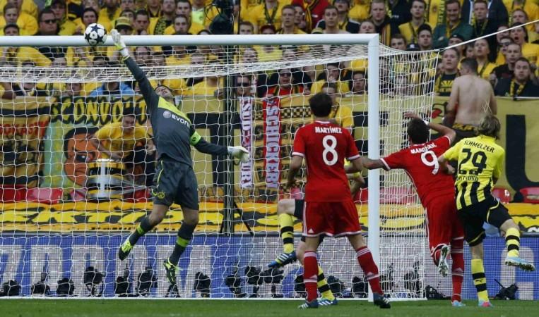 Borussia Dortmund's goalkeeper Roman Weidenfeller saves a shot by Bayern Munich's Mario Mandzukic during their Champions League Final soccer match at Wembley Stadium in London Borussia Dortmund, Roman Weidenfeller