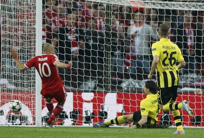Borussia Dortmund's Neven Subotic clears the ball off the line during their Champions League Final soccer match against Bayern Munich at Wembley Stadium in London Borussia Dortmund, Neven Subotic