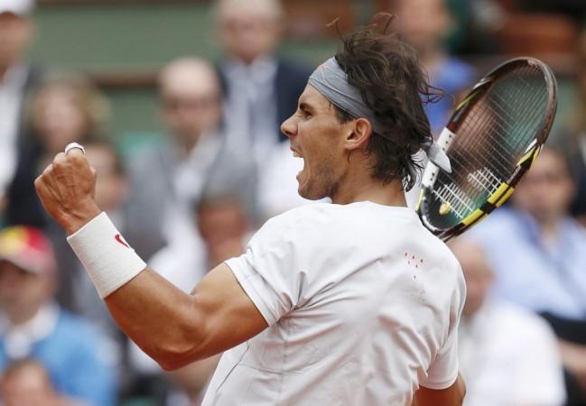 Rafael Nadal of Spain celebrates beating Brands of Germany in their men's singles match at the French Open tennis tournament in Paris Rafael Nadal