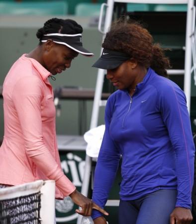 Williams of the U.S. and her sister Serena arrive to attend a training session for the French Open tennis tournament at the Roland Garros stadium in Paris French Open
