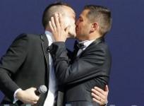 vincent-autin-l-and-bruno-boileau-r-kiss-after-their-wedding-vows-on-the-terrace-of-the-city-hall-in-montpellier-may-29-2013-the-two-men-are-the-first-same-sex-couple-to-marry-in-france-under-a-reform-which-has-stoked-some-of-the-ugliest-protests