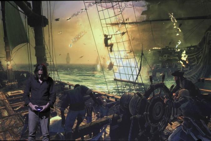 A game developer demonstrates Assassin's Creed IV Black Flag at the Sony news conference show on the eve of the opening of E3, the Electronic Entertainment Expo, in Los Angeles Sony PS4