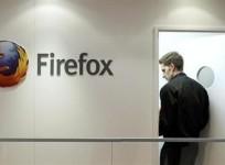 a-man-is-seen-next-to-a-firefox-logo-at-a-mozilla-stand-during-the-mobile-world-congress-in-barcelona-february-28-2013