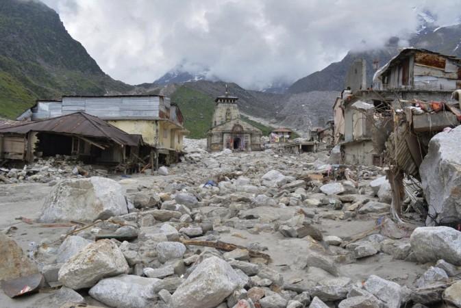 The Kedarnath Temple (C) is pictured amid damaged surroundings by flood waters at Rudraprayag in the Himalayan state of Uttarakhand June 20, 2013. (Reuters) North India Floods