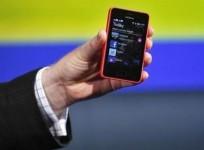 a-nokia-official-displays-a-new-99-phone-in-its-mid-range-asha-line-at-a-launch-in-new-delhi-may-9-2013