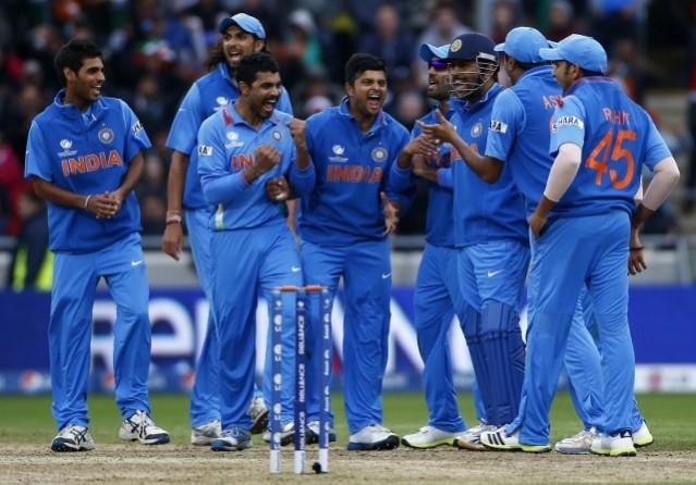 Indian players celebrate the wicket of England batsman Ian Bell in their ICC Champions Trophy 2013 final India
