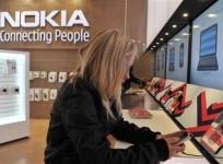 a-girl-tests-out-the-new-mobile-phone-at-the-nokia-flagship-store-in-helsinki