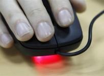 an-employee-uses-a-computer-mouse-inside-an-office-in-kiev-april-24-2012