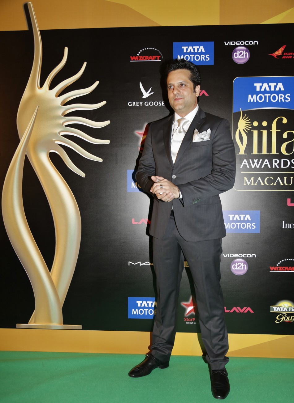 Bollywood actor Fardeen Khan poses on the green carpet before the 14th annual International Indian Film Academy (IIFA) awards IIFA Awards 2013: Bollywood Celebrities on Green Carpet