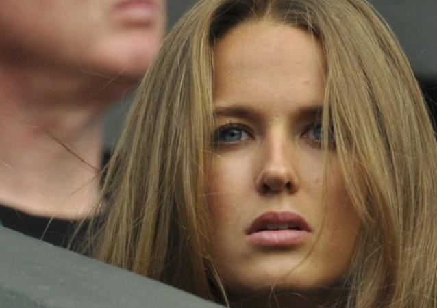 Kim Sears, the girlfriend of Andy Murray of Britain, sits on Centre Court for Murray's men's singles tennis match against Mikhail Youzhny of Russia at the Wimbledon Tennis Championships, in London Kim Sears