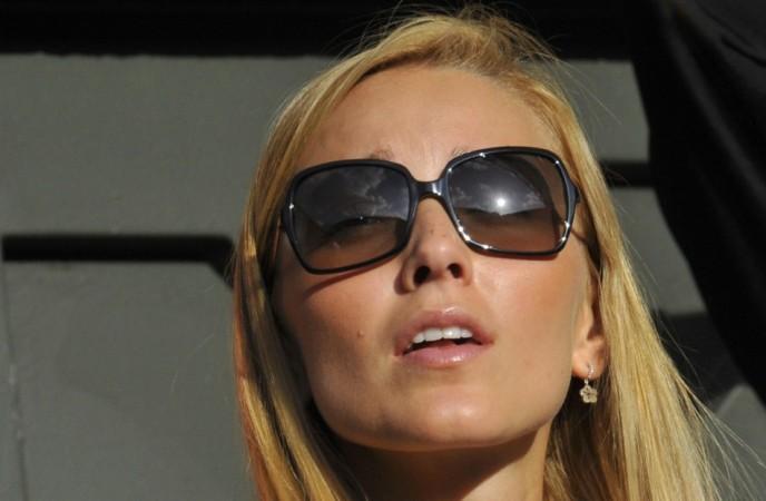 Jelena Ristic, the girlfriend of Novak Djokovic of Serbia, sits on Centre Court for his men's singles tennis match against Tommy Haas of Germany at the Wimbledon Tennis Championships, in London Jelena Ristic