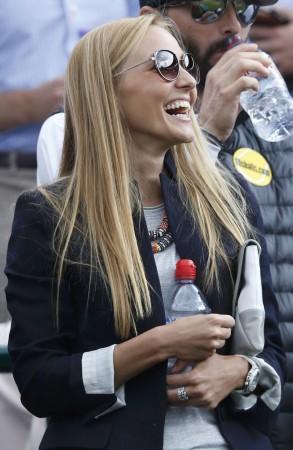 Jelena Ristic, the girlfriend of Novak Djokovic of Serbia, celebrates after Djokovic defeated Tomas Berdych of the Czech Republic in their men's quarter-final tennis match at the Wimbledon Tennis Championships, in London Jelena Ristic