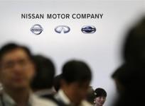 nissan-motor-company039s-logo-is-seen-at-a-reception-with-shareholders-after-the-general-shareholders039-meeting-in-yokohama-south-of-tokyo-june-25-2013