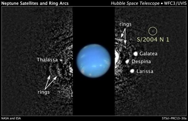 The location of a newly discovered moon orbiting Neptune is seen in this composite Hubble Space Telescope handout image. The location of a newly discovered moon orbiting Neptune is seen in this composite Hubble Space Telescope handout image.