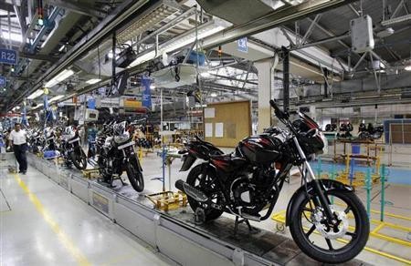 Newly built motorbikes are seen at the Bajaj Auto Ltd. plant in Pune, about 130 km (82 miles) from Mumbai August 9, 2007.