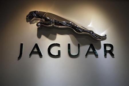 The Jaguar logo is pictured at a Jaguar Land Rover showroom in Mumbai February 13, 2013.