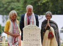 u-s-vice-president-joe-biden-c-his-wife-jill-l-and-tara-gandhi-the-granddaughter-of-mahatma-gandhi-pay-homage-at-the-mahatma-gandhi-memorial-at-gandhi-smriti-in-new-delhi-july-22-2013-reuters