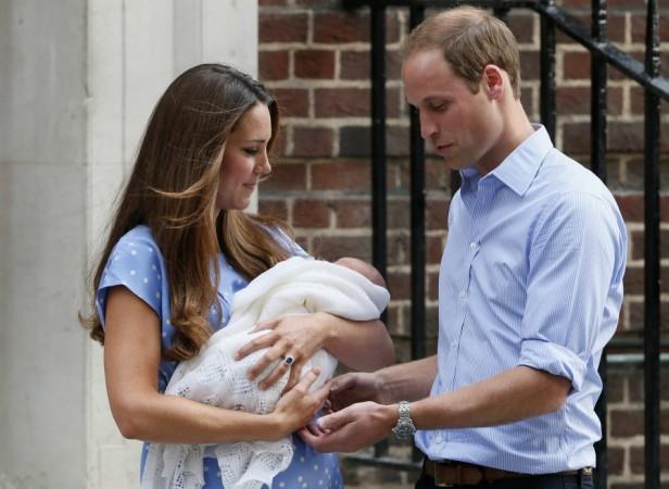 Britain's Prince William and his wife Catherine, Duchess of Cambridge appear with their baby son, as they stand outside the Lindo Wing of St Mary's Hospital, in central London Royal Baby