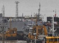 Ships and a submarine belonging to the Indian Navy are seen docked at the naval dockyard in Mumbai.