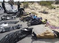 army-soldiers-and-medical-workers-check-the-bodies-of-police-officers-killed-early-morning-on-the-highway-in-rafah-city