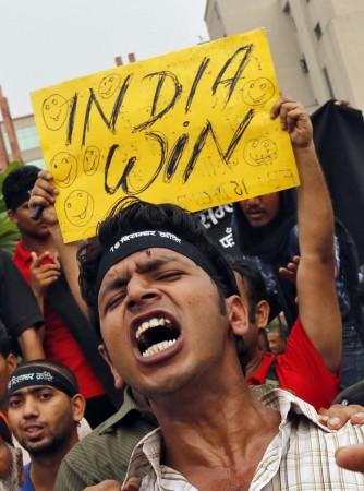 A demonstrator shouts slogans after four men convicted of raping and murdering a 23-year-old woman last December were sentenced to death, outside a court in New Delhi Delhi gang-rape case
