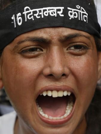 A protester shouts slogan outside a court in New Delhi Delhi gang-rape case