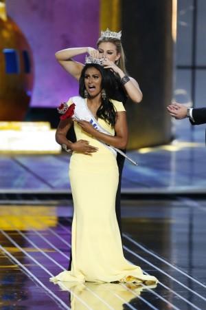 Miss America contestant, Miss New York Nina Davuluri reacts as she is chosen as winner of the 2014 Miss America Pageant in Atlantic City, New Jersey Nina Davuluri