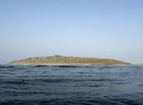 an-island-that-rose-from-the-sea-following-an-earthquake-is-pictured-off-pakistans-gwadar-coastline-in-the-arabian-sea