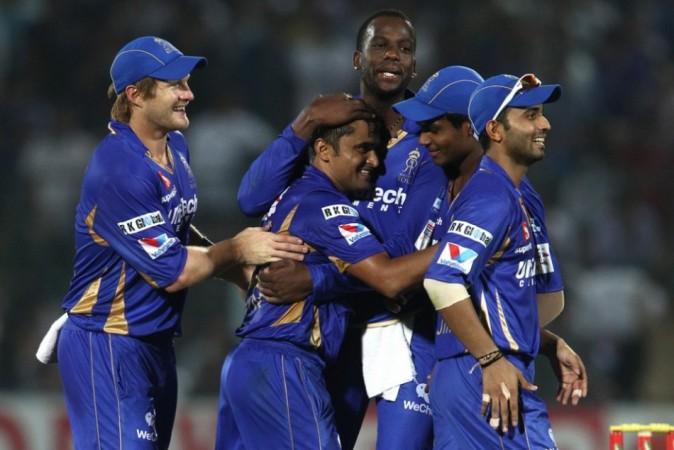 Royals leg-spinner Pravin Tambe celebrates with his teammates after picking up CSK left-hander Suresh Raina in their CLT20 semifinal, October 4. Shaun Roy/CLT20/SPORTZPICS Tambe Royals