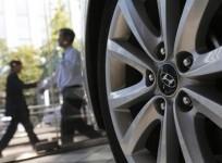 the-logo-of-hyundai-motor-co-is-seen-on-a-wheel-of-a-car-at-a-hyundai-dealership-in-seoul-october-21-2013