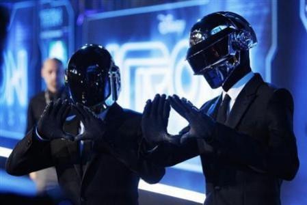 Musicians Thomas Banglater and Guy-Manuel de Homem-Christo of Daft Punk pose at the world premiere of the film ''TRON: Legacy'' in Hollywood, California, December 11, 2010. Daft Punk
