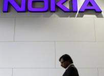 file-picture-shows-a-man-walking-past-a-nokia-logo-during-the-mobile-world-congress-in-barcelona