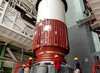 1-first-stage-nozzle-end-segment-being-placed-on-launch-pedestal